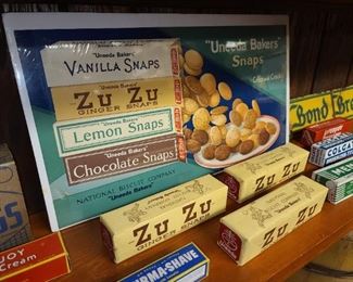Vintage Zu Zu Cardboard Sign W/ Package Examples