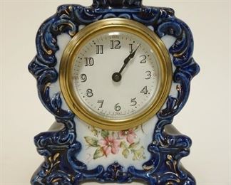 1027 SETH THOMAS CHINA CLOCK *LILY* APPROXIMATELY 3 1/4 IN X 6 1/2 IN X 7 3/4 IN HIGH