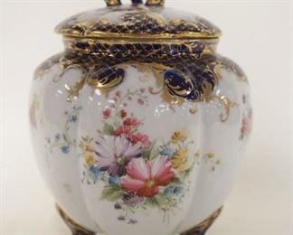 1054 CHINA FOOTED & RIBBED BISQUIT JAR W/HAND PAINTED FLOWERS, APPROXIMATELY 8 IN HIGH