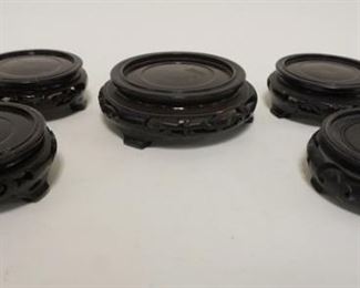1101 GROUP OF WOOD CARVED ASIAN STANDS/BASES, LARGEST IS APPROXIMATELY 5 IN X 1 1/2 IN HIGH