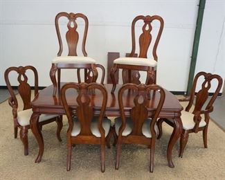 1135 LEGACY BANDED DINING TABLE & CHAIRS, TABLE HAS 2 SKIRTED LEAVES W/ 8 CHAIRS, 6 SIDE & 2 ARM, TABLE APPROXIMATELY 72 IN X 44 IN X 30 IN HIGH, LEAVES 12 IN WIDE
