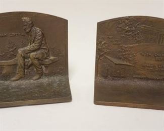 1166 BRONZE ABRAHAM LINCOLN BOOKENDS DATED C 1916 W/WHITEHOUSE & LINCOLN BIRTH PLACE, APPROXIMATELY 3 IN X 5 1/2 IN X 5 IN HIGH