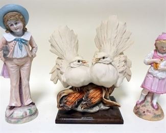 1246 LOT R. PENNNATI CAPODIMONTE PORCELAIN DOVE PERCHED ON TOP OF CORN COBS AND 2 BISQUE FIGURES OF BOY AND GIRL HOLDING A CAT