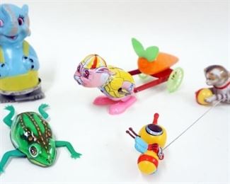 1254 LOT OF 4 VINTAGE WIND UP AND FRICTION TOYS