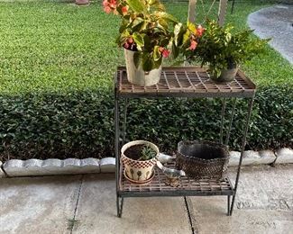 outdoor shelf, assorted plants and planters, baskets, etc