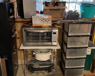 oven, electric skillet, crock pot, filing accessories and cabinets, a lot of misc stuff of interest