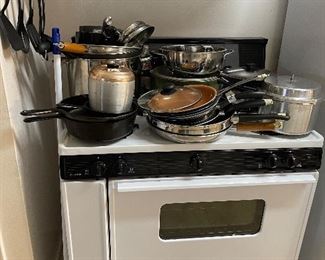 Assorted pots and pans, skillets, pressure cooker, cast iron (STOVE NOT FOR SALE)