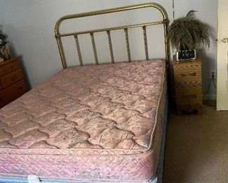 Brass bed with mattress and box springs
