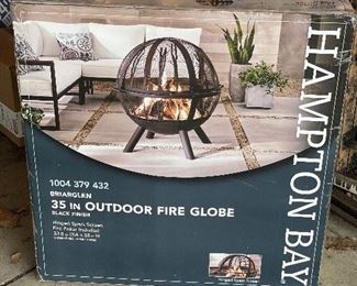 Never used/new in box outdoor fireplace. Mod sphere shape. 