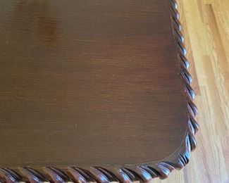 TRIPLE PEDESTAL TABLE WITH BRAIDED EDGE AND 2ARM AND 6 ARMLESS CHAIRS AND 2 HUGE LEAVES