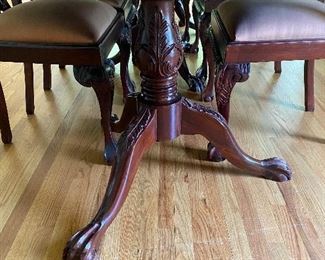 TRIPLE PEDESTAL TABLE WITH BRAIDED EDGE AND 2ARM AND 6 ARMLESS CHAIRS AND 2 HUGE LEAVES