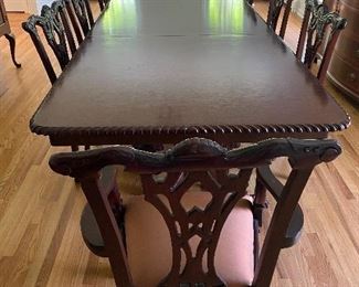 TRIPLE PEDESTAL TABLE WITH BRAIDED EDGE AND 2ARM AND 6 ARMLESS CHAIRS AND 2 HUGE LEAVES