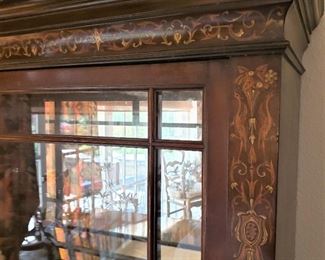 Details of Antique inlaid mahogany curio cabinet
