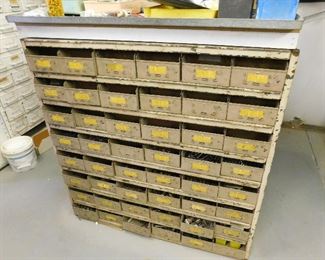 Complete Industrial 42 drawer tool drawer. (we have the missing drawer from the photos) Drawers are sold as a unit and full of items.