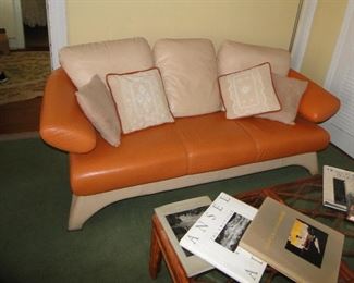 Mid-century modern leather? Pleather? Sofa very heavy