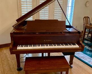 This Kawai baby grand would be gorgeous in your home and sound gorgeous as well. 