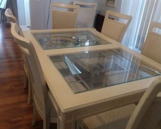 Beautiful Glass top  table  8 chairs & an extra leaf