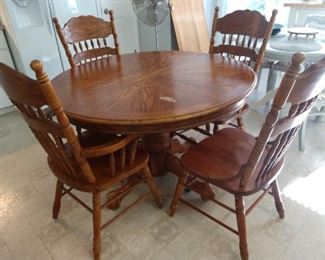 Solid Oak Table with leaf & 4 chairs