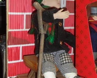 Tiny Tim sitting on bench