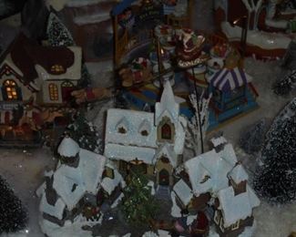 3 houses,tree,w/Santa & reindeer flying overhead