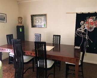Asian Inspired Interior Dining 
Table With Six Black Lacquer Chairs