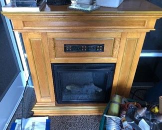 Electric fireplace works fine ( little warped on top ) only $50