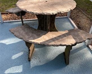concrete table (fairly lightweight and easily movable)