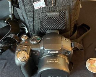 canon powershot digital camera and case
