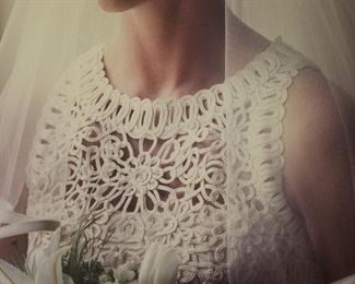 Italian made Wedding Dress. Dimension: 36" bust, 27" waist, 14" waist to collar, 37" bottom of waist to floor, 18" train.