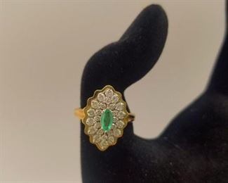 AVAILABLE FOR PRESALE. MQ Shape cluster with 26 diamonds & one 5.5 mm emerald shape Emerald 14k Gold.