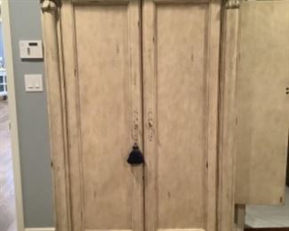 Beige Armoire, has side storage as well as inside storage!