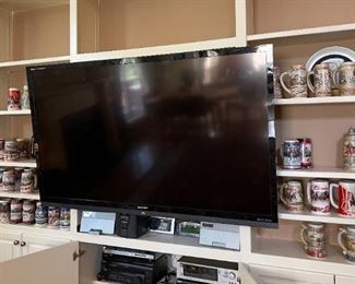 70" FLATSCREEN TV,  SHARP 'AQUOS'. TV WALL BRACKET DOES NOT CONVEY. BUYERS MUST BRING TOOLS  AND APPROPRIATE HELP. 
