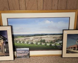 Many large framed photos of Gwinnett schools built by Jim Steele as Cheief Operations Officer of GCPS