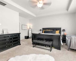 New Classic Home Furnishings -- Dresser, two (2) Night tables, and Bed frame/mattress (sold separately); hardwood decorated with a dark, distinct black coloring.