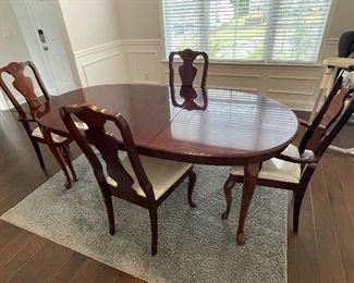Cherry veneer dinning room tables and chairs