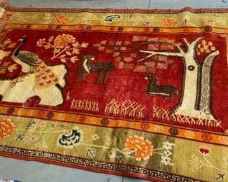 Very pretty pictorial hand made rug. 