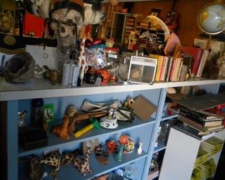 Giraffe figurines, many small decorative pieces. 