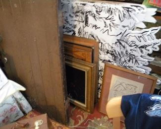 Large wooden doors, many paintings. 