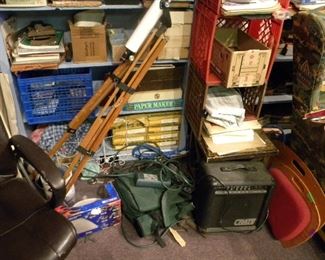 Telescope, guitar amp. Reams of paper. 