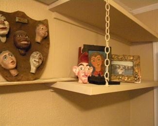Puppetry items and paintings. 