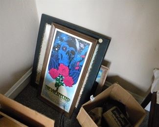 Many framed posters. 