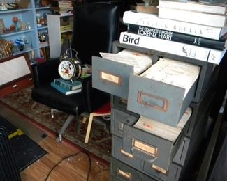 Music filing cabinet and Mickey Mouse clock. 