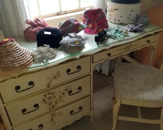 Desk that is part of six piece set . Painted daisies.
