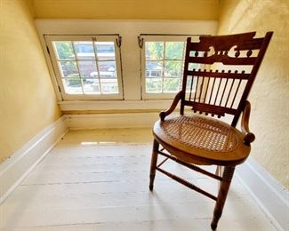 Antique caned seat "hip-hugger" chair