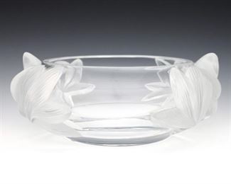 A late 20th century Lalique "Pivoine" pattern Crystal center bowl. Clear round form with frosted peonies at sides. Acid etched "Lalique France" signature. Minor wear. 10 1/2" diameter and 4 1/4" high. ESTIMATE $400-600