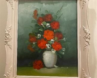 Roses are red in a nice antique white frame!