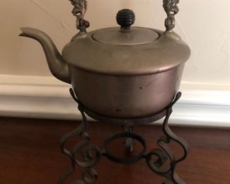 Antique tea kettle with warming stand