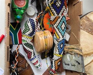South African items including buffalo horns decorating in beading 