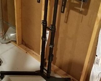 On wheels, portable monitor stand. 2 of these, 1 still in box