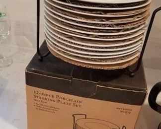 2 sets of stacking plates, with holder. Never used, in boxes